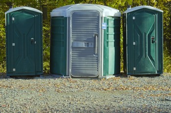 What is the typical rental price of a portable toilet?